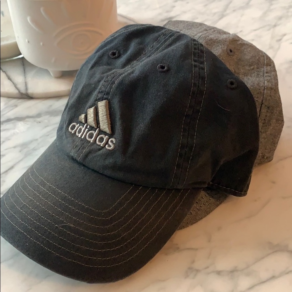 Two Adidas workout hats